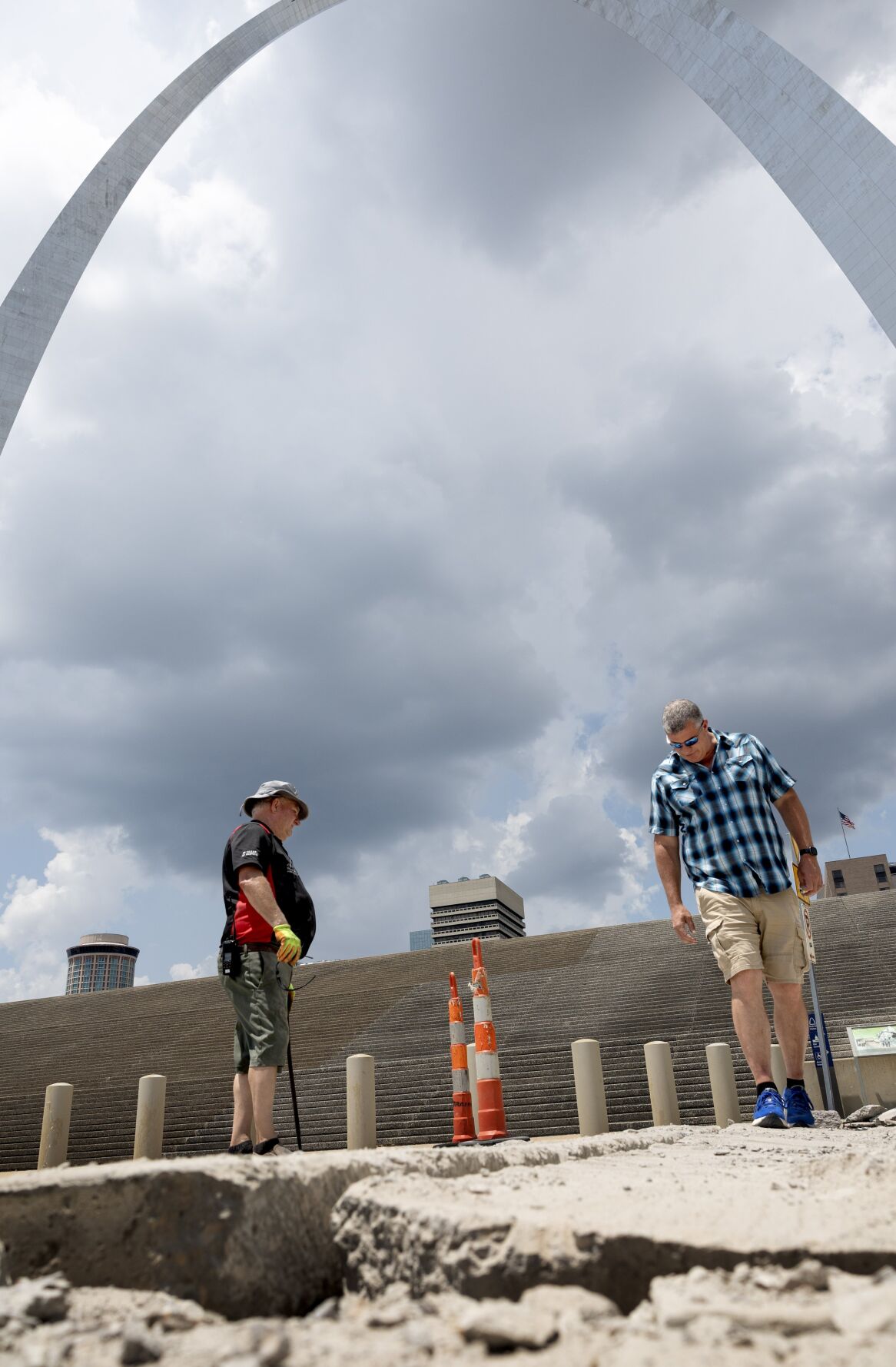 Heat buckles pavement on Leonor K. Sullivan Blvd. near Arch